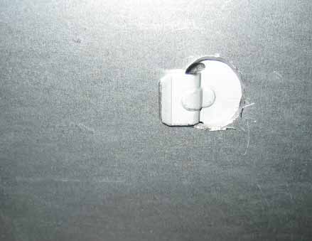 Closeup of tab in hole